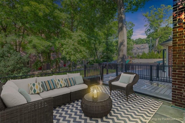 patio terrace at dusk with outdoor lounge area