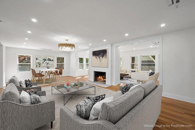 living room featuring a healthy amount of sunlight and wood-type flooring