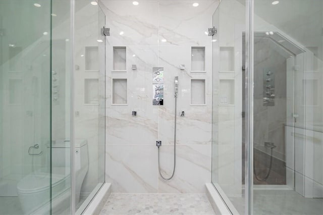 bathroom featuring an enclosed shower