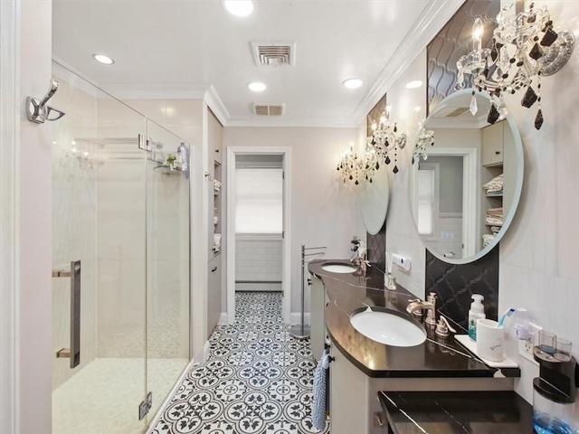 bathroom featuring decorative backsplash, vanity, an enclosed shower, and ornamental molding