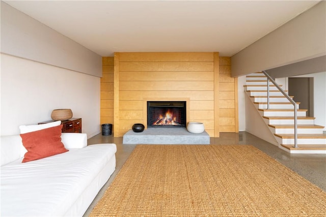 living room with concrete flooring