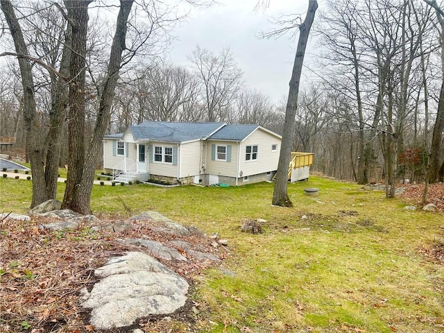 exterior space with a front yard