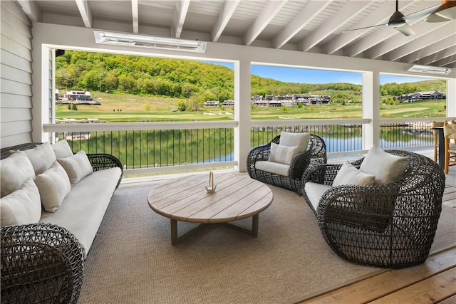 view of patio featuring outdoor lounge area and a water view