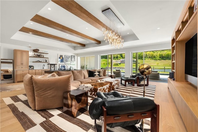 292 Wood Duck Rd, Amenia, NY 12501 - living room featuring a raised ceiling, light hardwood / wood-style flooring, beamed ceiling, and a notable chandelier