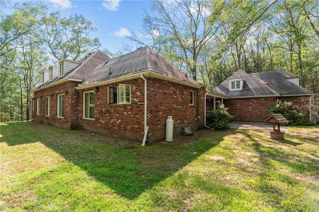 view of home's exterior featuring a lawn