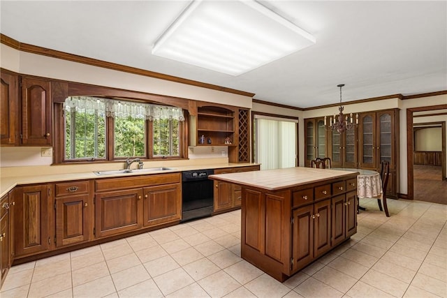 kitchen with dishwasher, sink, a center island, an inviting chandelier, and pendant lighting