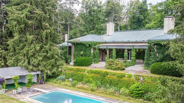 back of house featuring a patio area