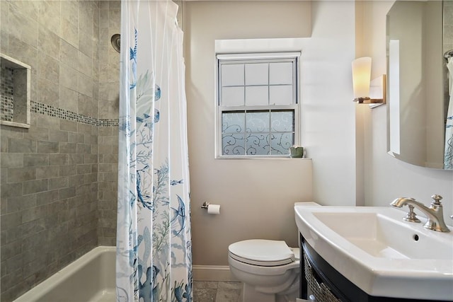 full bathroom with vanity, toilet, and shower / bath combo with shower curtain