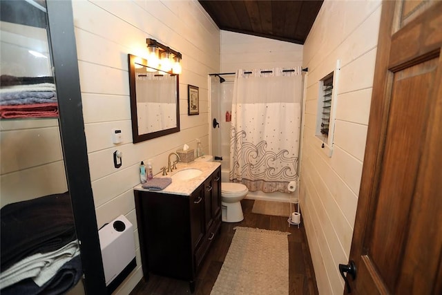 full bathroom featuring vanity, vaulted ceiling, toilet, wood-type flooring, and wood ceiling