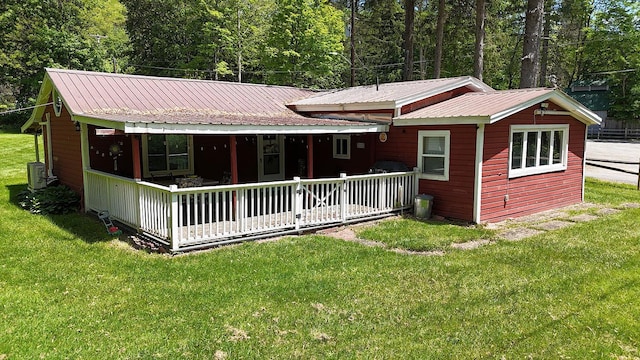 10 Ferry St, Fremont Center, NY 12736 - back of property with a porch, a yard, and metal roof