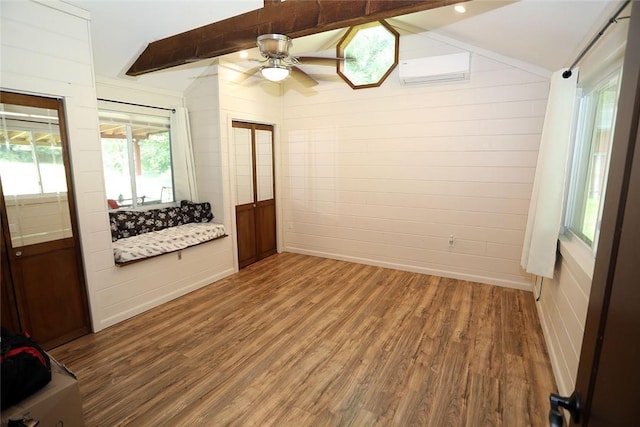 10 Ferry St, Fremont Center, NY 12736 - empty room featuring ceiling fan, wood finished floors, and a wall unit AC