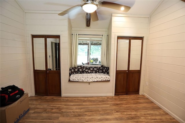 10 Ferry St, Fremont Center, NY 12736 - sitting room with wood finished floors, a ceiling fan, and wood walls
