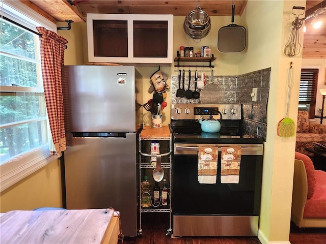 kitchen with backsplash, wooden ceiling, dark hardwood / wood-style flooring, and stainless steel appliances