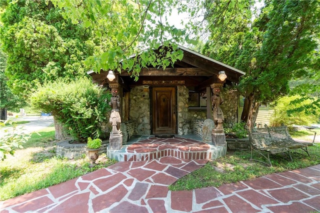 doorway to property featuring a porch