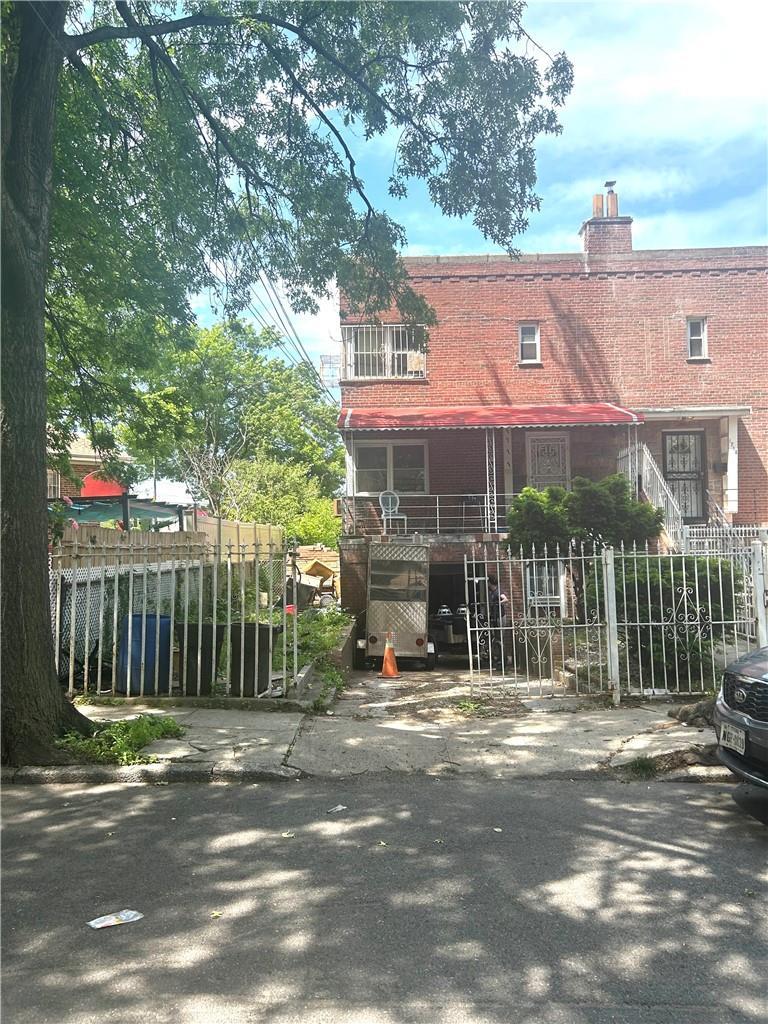1711 Mansion St, Bronx, NY 10460 - back of property with a chimney