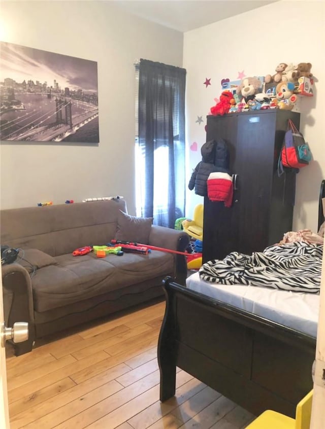 bedroom featuring hardwood / wood-style flooring