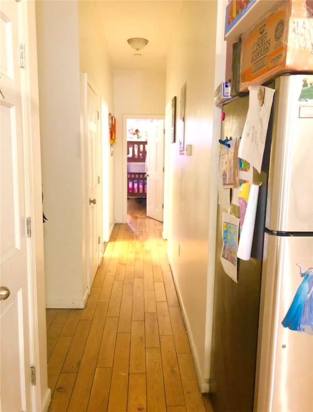 hall featuring light hardwood / wood-style flooring