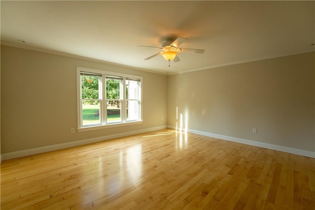 unfurnished room featuring light wood-type flooring, ceiling fan, and ornamental molding