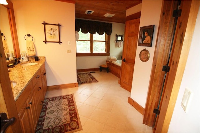 bathroom featuring a washtub, vanity, wooden ceiling, and tile patterned flooring