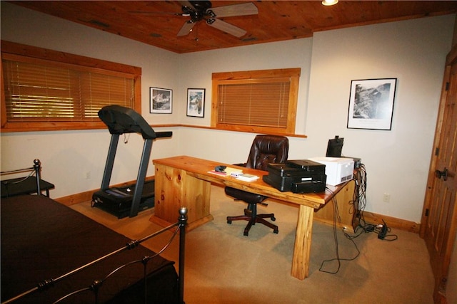 carpeted home office with ceiling fan and wooden ceiling