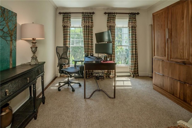 office featuring a baseboard heating unit, light colored carpet, and ornamental molding