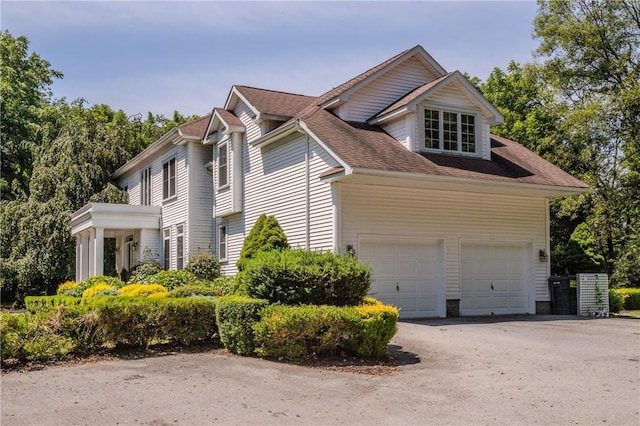 view of home's exterior featuring a garage