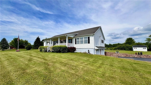 view of property exterior with a lawn, a porch, and a garage