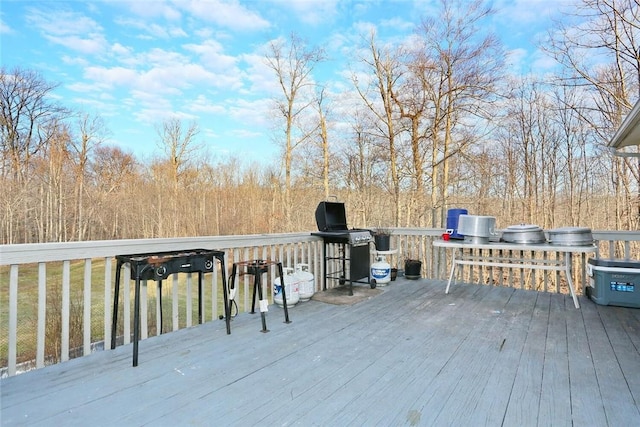 wooden deck with area for grilling