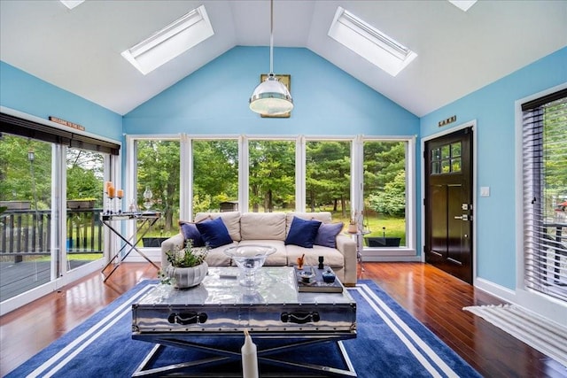 sunroom / solarium with lofted ceiling with skylight and plenty of natural light