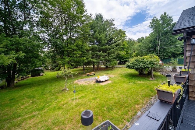 view of yard with a deck