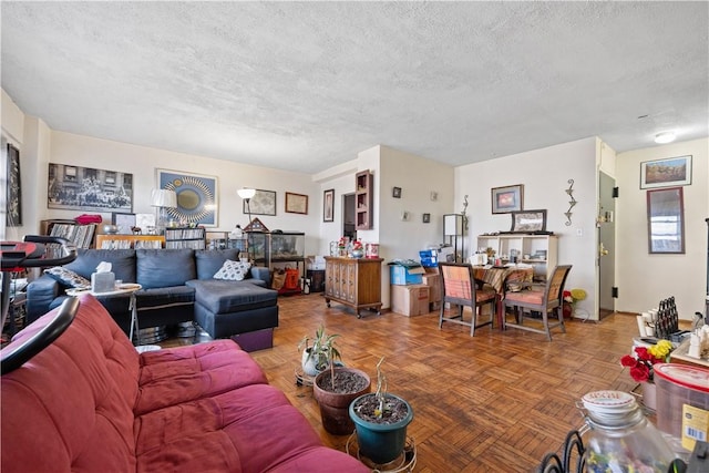 living room with a textured ceiling and parquet flooring