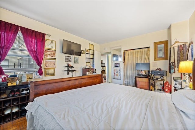 bedroom with parquet floors