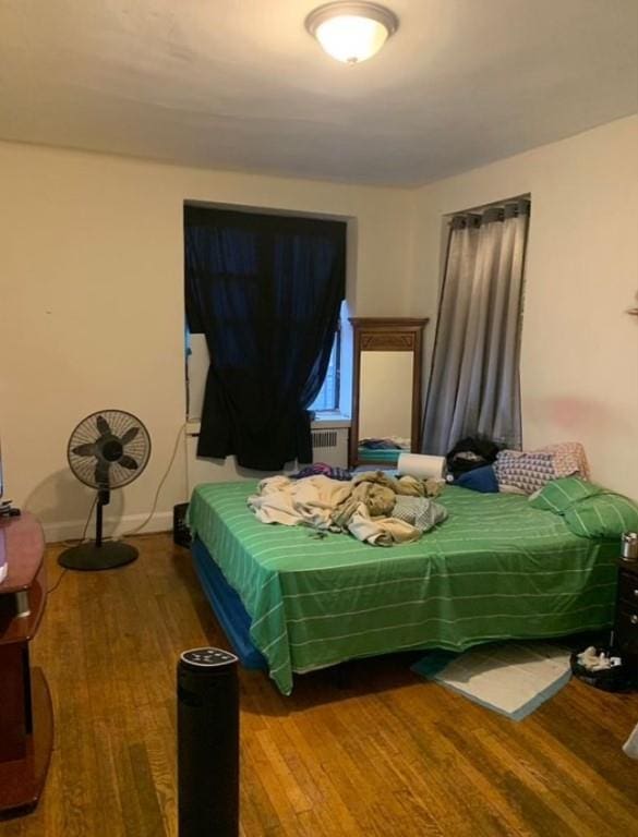 bedroom featuring hardwood / wood-style flooring