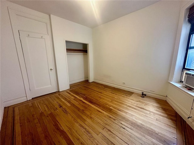 unfurnished bedroom featuring light hardwood / wood-style flooring