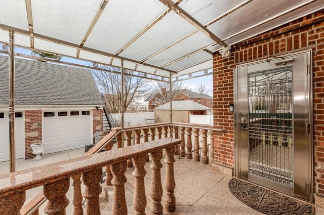 view of patio / terrace with a garage