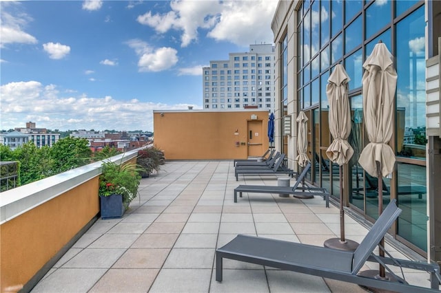 view of patio / terrace with a balcony