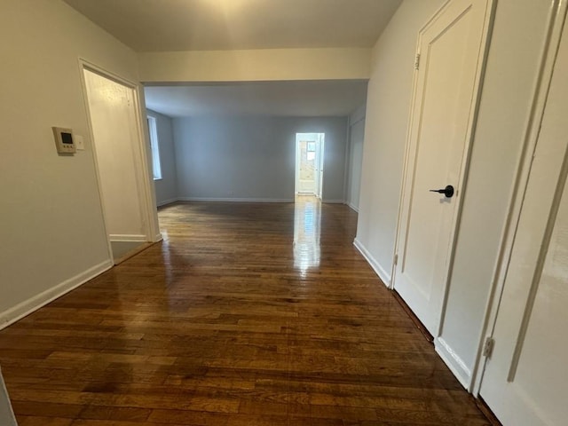 hall featuring dark wood-type flooring