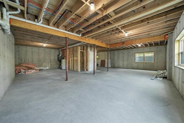 basement featuring gas water heater