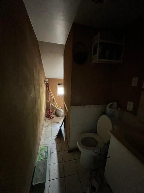 bathroom featuring tile patterned floors and toilet