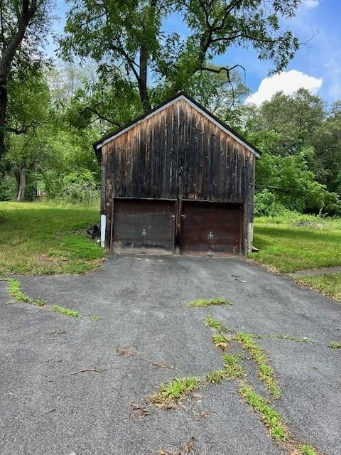 garage with a yard