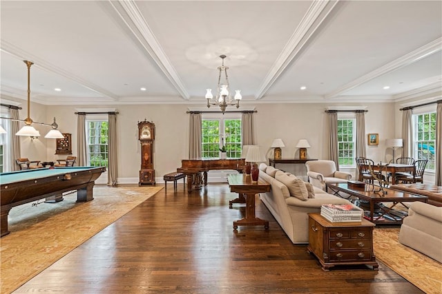 living room featuring dark hardwood / wood-style flooring, ornamental molding, and pool table