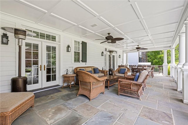 view of patio / terrace featuring ceiling fan, an outdoor hangout area, and french doors