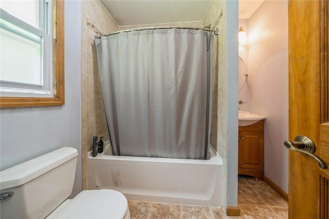 bathroom with shower / tub combo, vanity, and toilet