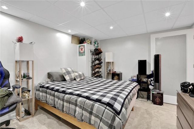 bedroom featuring a drop ceiling