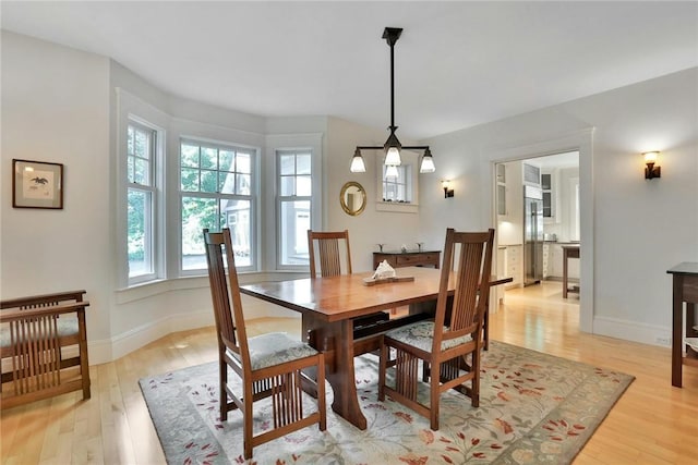 dining room featuring light hardwood / wood-style flooring