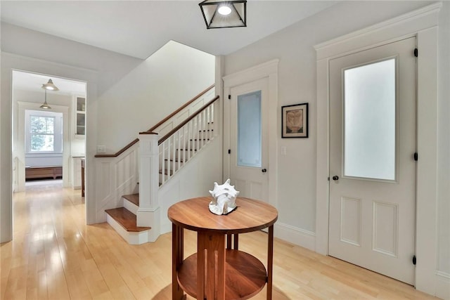 entrance foyer with light hardwood / wood-style floors