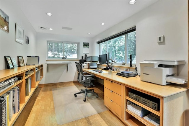 office space featuring light wood-type flooring