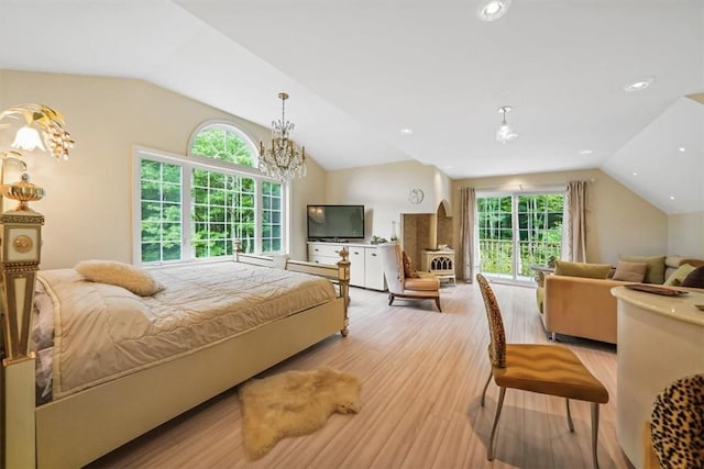 bedroom with a chandelier, lofted ceiling, light hardwood / wood-style flooring, and multiple windows