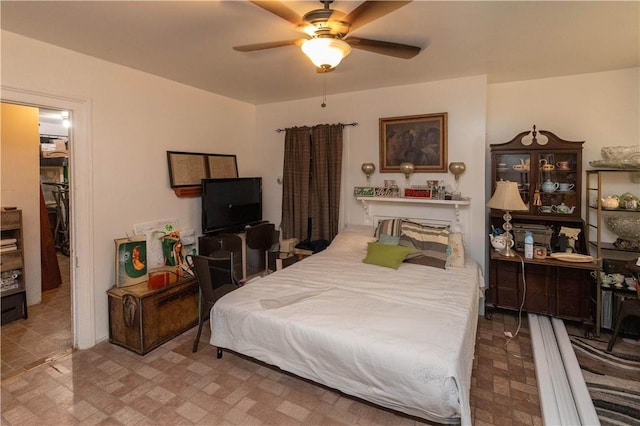 bedroom featuring ceiling fan