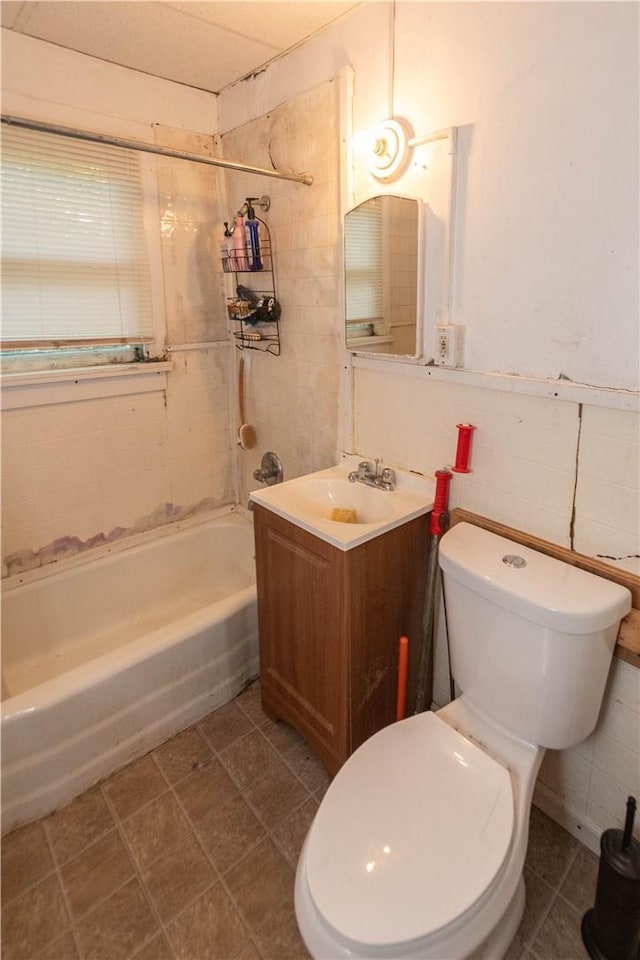 full bathroom featuring vanity, toilet, and shower / bathtub combination